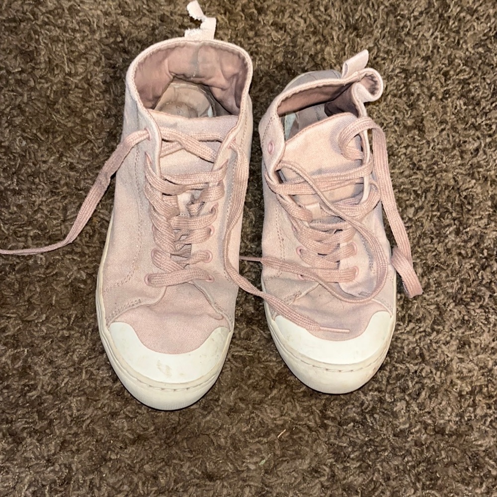 Pink high top shoes